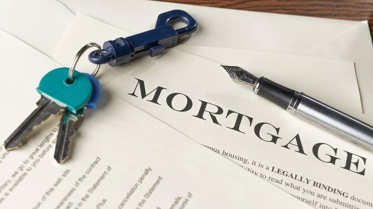 a%20mortgage%20document%20with%20a%20set%20of%20keys a%20mortgage%20document%20with%20a%20set%20of%20keys
